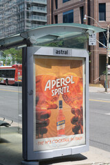 Obraz premium OOH transit shelter advertising poster for Aperol Spritz (Italian bitters) in Toronto