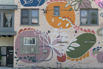 Obraz premium big floral mural on the north elevation of 215 Madison Av location of Gleam & Sip matcha & espresso catering and cafe, Dupont by the Castle BIA, Toronto