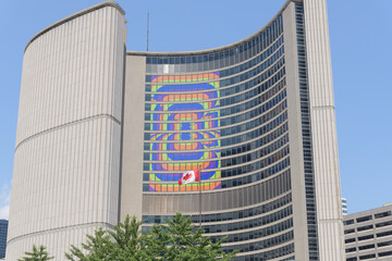Obraz premium Toronto City Hall, a host city of the FIFA World Cup 26 with brand logo in administrative tower windows 