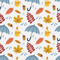 Autumn seamless pattern with a umbrella, autumn leaves, acorn  , candle,  on a white background. Vector graphics for childrens wallpaper, packaging, cover and prints for clothing © Irina
