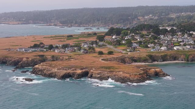 Enjoy the aerial views of Mendocino California with its rugged coastline and music festival tent in the lively coastal village