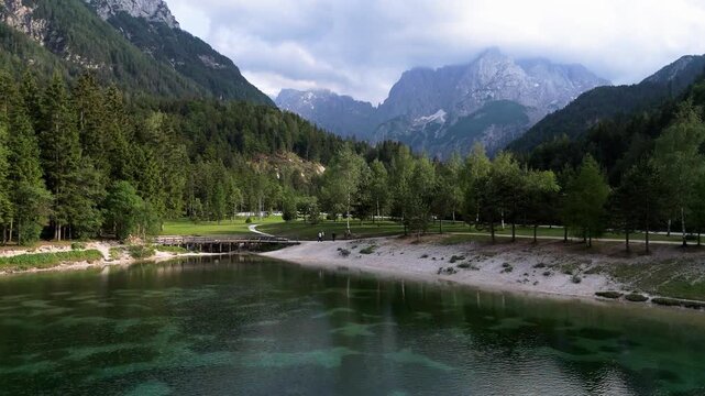 Low Drone Flight Over Jasna Lake Rising to Triglav, Julian Alps