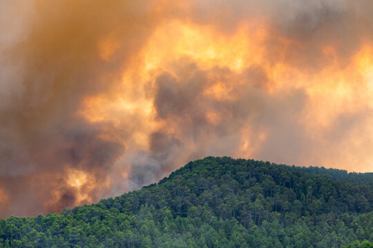 Spanish countryside devastated by a fast-moving summer forest fire incident Madrid