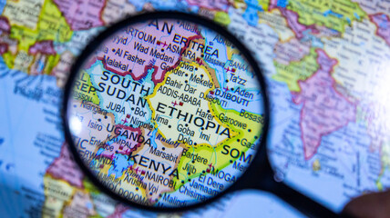 Map of East Africa under magnifying glass. Focus on Ethiopia, Kenya, South Sudan. © Photo Agency