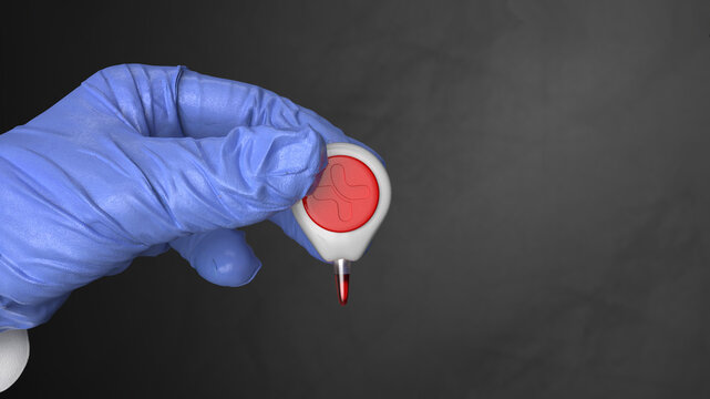 Close-up of a hand in blue glove holding a needleless blood micro-sampling device, Tasso Inc HemoLink.