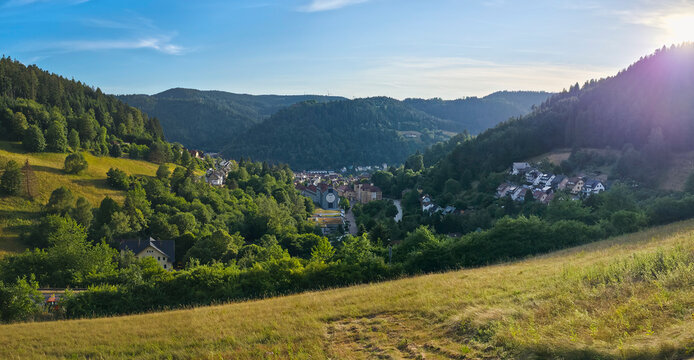 germany, stunning xxl panorama sunset above schramberg village embracing the entire schwarzwald valley with endless summer landscape and brilliant blue sky