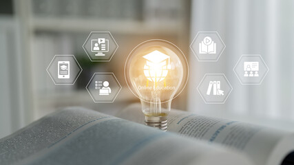 Close-up view of an open book with a glowing lightbulb, representing online education. Icons highlight digital learning, fostering creativity and motivation in academic pursuits. Cyphers © InfiniteFlow
