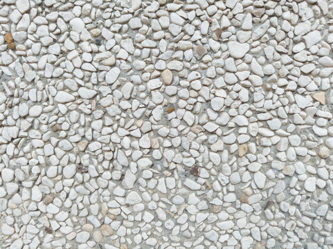 White pebble exposed aggregate concrete surface texture background