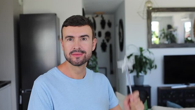Wizard casting spell using silver magic wand
