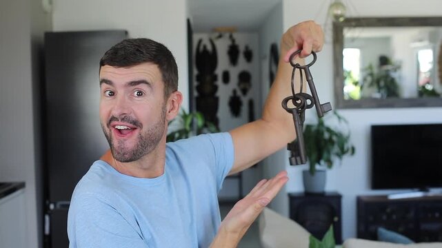 Man holding large ancient keys 