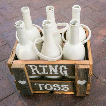 Ring Toss Game with White Bottles