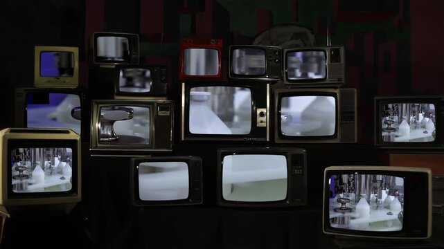 Vintage Television Wall Displaying Industrial Pharmaceutical Production Line