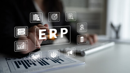 Fototapeta premium Modern workspace showcasing a business professional using ERP software. Digital icons represent key business functions, emphasizing efficiency and productivity in management. Ledger