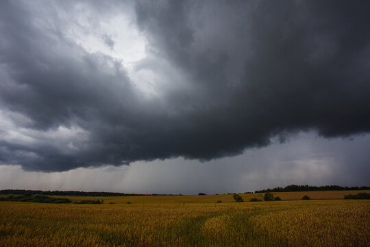 Angry supercell storm influenced by Climate change. Dangerous storm supercell shelf cloud with layers