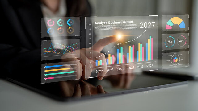Close-up of a professional analyzing business growth trends through an interactive dashboard. The visuals enhance decision-making and provide valuable insights for future planning. Cyphers