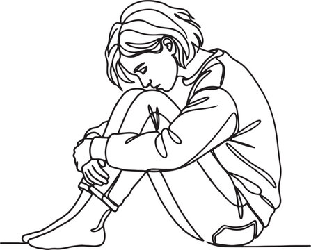 Woman sitting on floor, hugging knees, wearing striped sweater