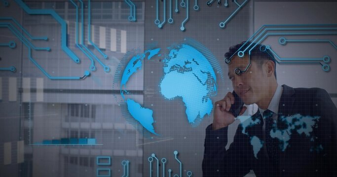 Phone call starting holo globe rotating while midadult Asian exec gesturing and showing global data