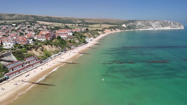 Aerial View of Swanage Beach with Ballard Down White Chalk Cliffs in Distance Dorset England
