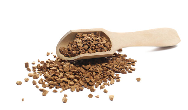 Instant coffee granules, soluble coffee in wooden spoon isolated white clipping, side view