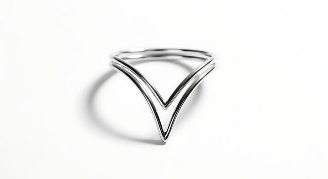Minimalist silver v shaped ring on white background modern jewelry design