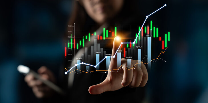 Business professional interacts with digital financial graphs while analyzing market trends and investment opportunities, highlighting economic growth and data insights. Scalp