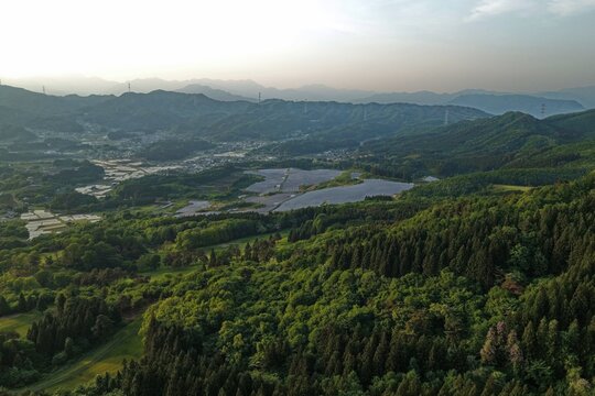 Aerial drone photo of solar farm and mountain landscape in Takayama Village, Gunma, Japan
