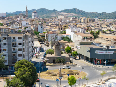 Aerial drone view of Pla&ccedil;a de s'Abeurador windmill roundabout in Manacor, Mallorca, Spain