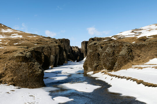 Majestic Fjadrargljufur canyon with river Fjadra flowing through in summer at Iceland