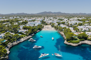 Aerial drone view of Cala Gran beach bay in Cala d'Or, Mallorca, Spain © NEWTRAVELDREAMS