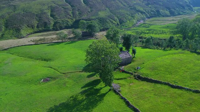 Aerial view from a drone of the winter landscape around the village of Vega de Pas. Pasiegos Valleys region, Cantabria, Spain, Europe