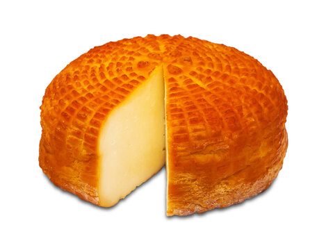 Piece of fresh round homemade smoked cheese on a transparent or white background. Side view. PNG.