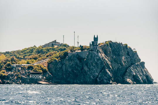 Yalta, Crimea, 6 August 2020, Swallow Nest Palace on cliff overlooking Black Sea