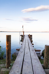 Fototapeta premium wooden pier on a lake serene summer