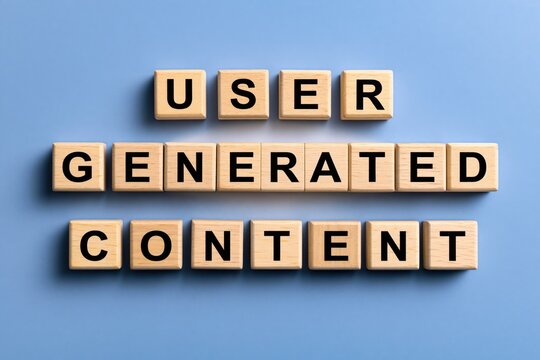 User generated content phrase made of wooden letter tiles on blue background