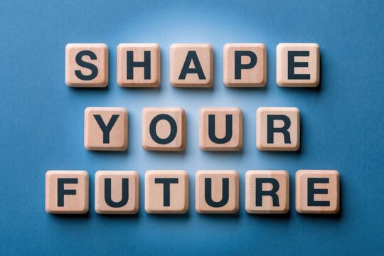 Shape your future phrase written with wooden tiles on blue background