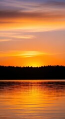 Fototapeta premium A breathtaking golden hour view over a calm lake where the setting sun reflects off the still water surface near the forest silhouette, twilight, glow, light