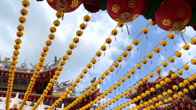 Rows of colorful lanterns decorating Thean Hou Temple in Kuala Lumpur, Malaysia. Traditional Chinese architecture and festive decorations at one of the city's most famous cultural landmarks.