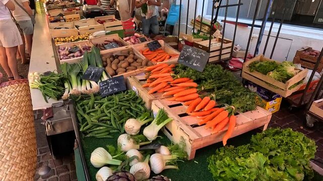Bustling Farmers Market in a Charming Brittany Town, France.
