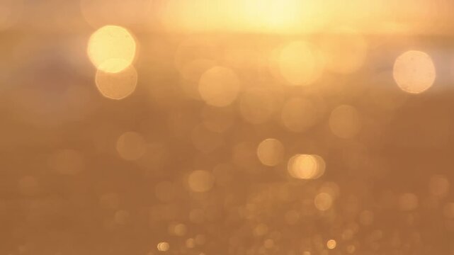 Reflection of sunset in water for natural background with glow and glitter