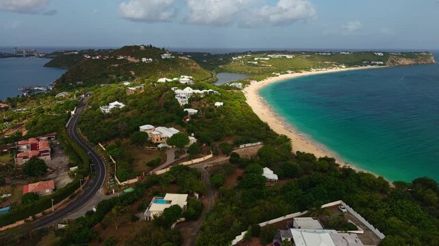 Drone Shot of St. Martin Island Coastline, Hills and Houses Between Baie Rouge Beach and SImpson Bay Lagoon