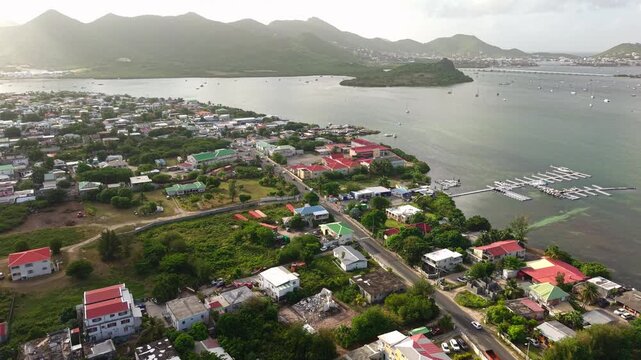 Drone Shot of Saint Martin Island, Marigot Town Buildings and Simpson Bay Lagoon on Sunny Evening