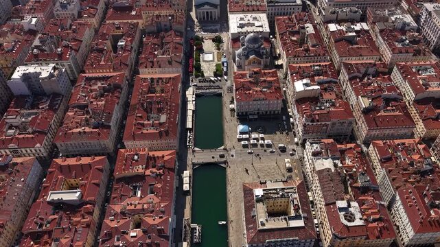 Trieste, Italy. Drone Shot of Canal Grande and Old Town Buildings and Churches on Sunny Morning