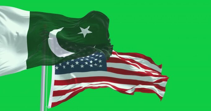 National flags of Pakistan and USA waving isolated on green background