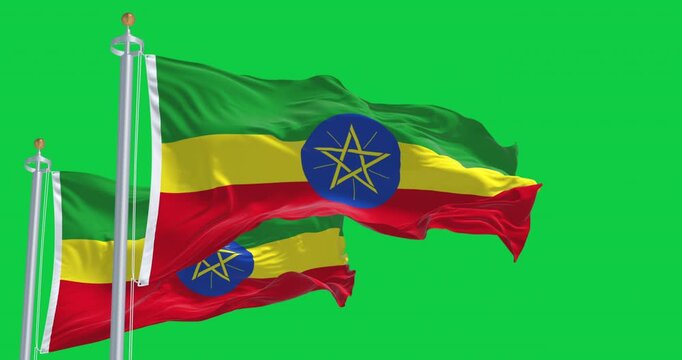 Close-up of Ethiopia national flags waving isolated on green background