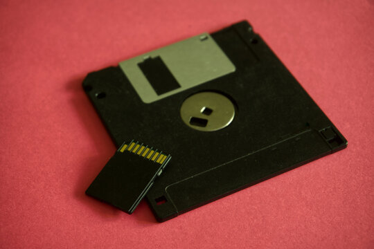 Floppy disk and sd card illustrating the progression of digital storage technology