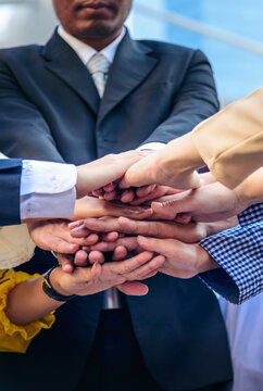 Vertical Partners hands together teamwork group of business people meeting in firm company office. Vertical Horizon of Diversity Hands join empower partnership teams connection Mergers acquisitions