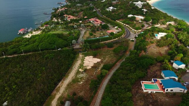 Revealing Drone Shot of St. Martin Island, Landscape, Roads, Buildings and Beaches on Caribbean Sea and Simpson Bay Lagoon
