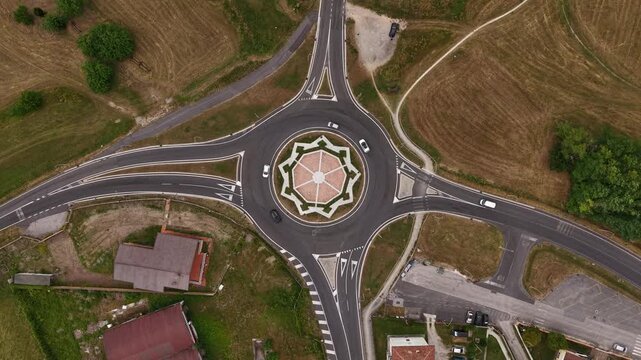 Drone Shot of Roundabout Traffic and Star Inside Circle, Geometrical Symmetry and Cars