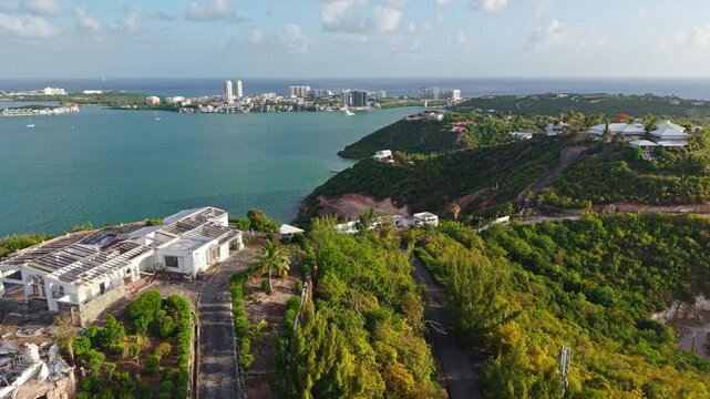 Drone Shot of Abandoned Hilltop Building Above Simpson Bay Lagoon and Landscape of St. Martin Island, Caribbean Sea