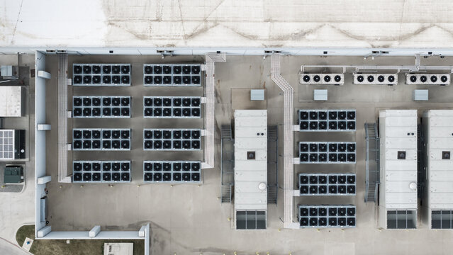 Aerial view cooling units on commercial building rooftop
